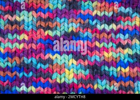 Pattern fabric made of wool. Handmade knitted fabric, color wool background texture. Warm accessories, clothing Stock Photo