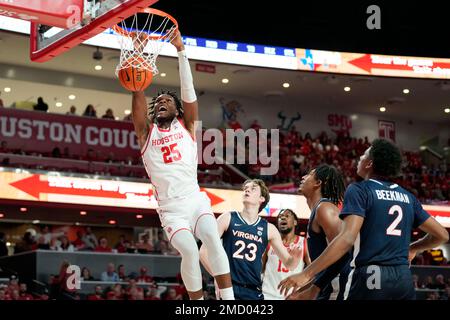 Houston center Josh Carlton (25) works to the basket as Oklahoma