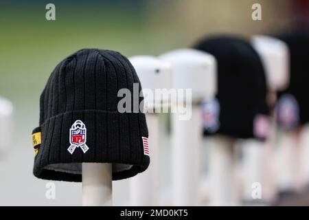 The Green Bay Packers Salute to Service hat is shown on the sidelines prior  to an NFL football game against the Seattle Seahawks, Sunday, Nov. 14,  2021, in Green Bay, Wis. (AP