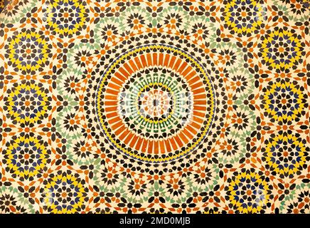 textures of ancient moroccan ceramic mosaic with geometric and floral pattern Stock Photo