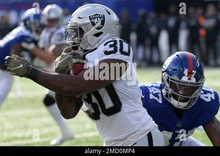 New York Giants linebacker Cam Brown (47) runs off the field