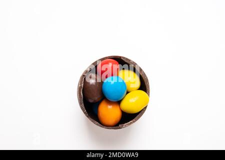 Chocolate easter egg with the top broken off Stock Photo - Alamy