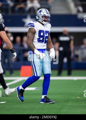 Oct 6, 2019: Dallas Cowboys defensive end Dorance Armstrong #92 reaches for Green  Bay Packers quarterback Aaron Rodgers #12 for a sack during an NFL game  between the Green Bay Packers and