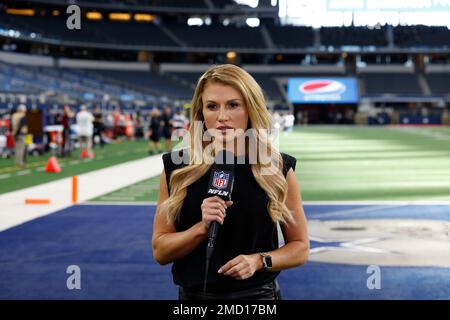 NFL network reporter Jane Slater poses after a report prior to an NFL  football game between the Carolina Panthers and the Dallas Cowboys, Sunday,  Oct. 3, 2021, in Arlington, Texas. (AP Photo/Matt