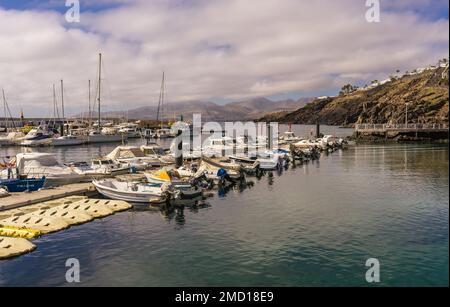 Boats moored in the harbour, Puerto del Carmen, Lanzarote. Stock Photo