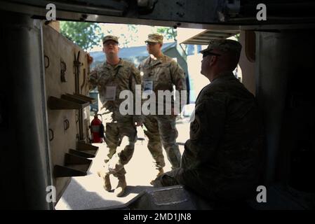 U.S. Army M109 Paladin artillery crew-members pull the 50