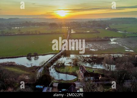 White Mill, Dorset, UK.  22nd January 2023.  UK Weather.  View from the air of White Mill on the River Stour near Wimborne in Dorset at sunset.  Picture Credit: Graham Hunt/Alamy Live News Stock Photo