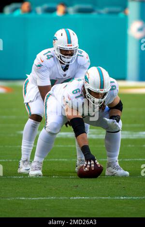 Miami Dolphins center Austin Reiter (61) warms up on the field before the  start of an NFL football game against the Atlanta Falcons, Sunday Oct 24,  2021, in Miami Gardens, Fla. (AP