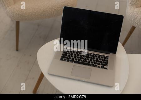 Laptop computer displaying the blank screen Stock Photo