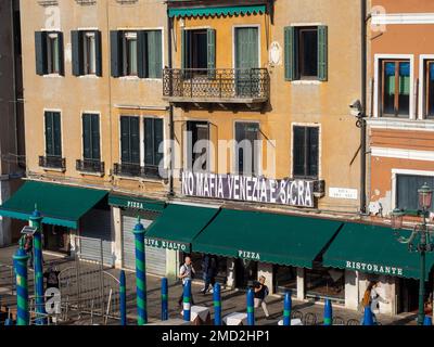 October 31, 2022 - Venice, Italy: Houses and restaurants on the grand canal. Tourism concept. Stock Photo