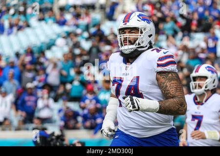 Buffalo Bills guard Cody Ford (74) jogs off the field after a play during  the first half of an NFL football game against the Jacksonville Jaguars,  Sunday, Nov. 7, 2021, in Jacksonville