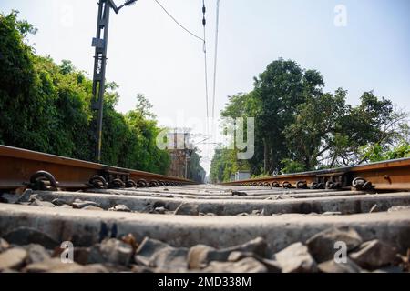 Picture of a rail anchor on a railway track of Indian Railways system. Stock Photo