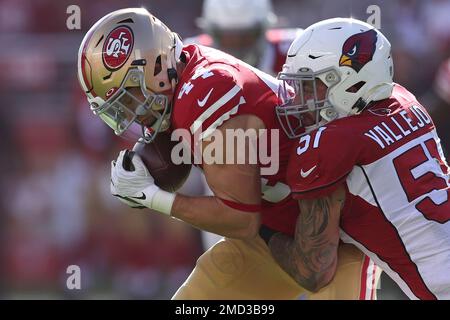 Arizona Cardinals linebacker Tanner Vallejo (51) wears an Ecuador flag  sticker on his helmet prior to an NFL football game against the Carolina  Panthers, Sunday, Oct. 2, 2022, in Charlotte, N.C. (AP