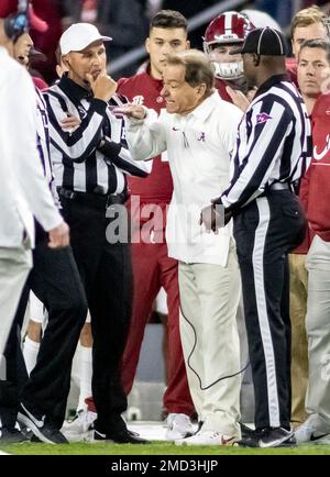 Alabama head coach Nick Saban, center, reacts to a lack of a targeting call  as an LSU defender hit Alabama quarterback Bryce Young during the second  half of an NCAA college football