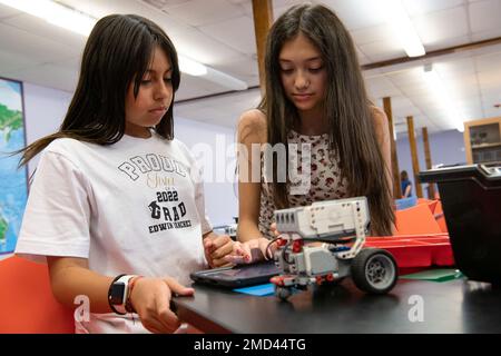 Students attending the STARBASE BattleBot camp assemble Lego pieces and other hardware on July 12, to build their robots during the three-day camp held July 12-14, 2022 at Camp Umatilla, Oregon. The Department of Defense's STARBASE program provides underserved students in the U.S. an opportunity to explore science, technology, engineering, and mathematics in a stimulating community based outreach program. (National Guard photo by John Hughel, Oregon Military Department Public Affairs) Air National Guard,Army National Guard,Department of Defense,Oregon National Guard,STEM education,Starbase, Stock Photo