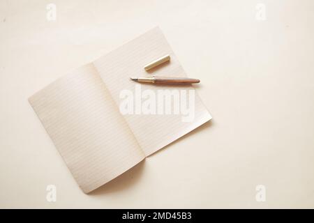 old empty paper and fountain pen on table  Stock Photo