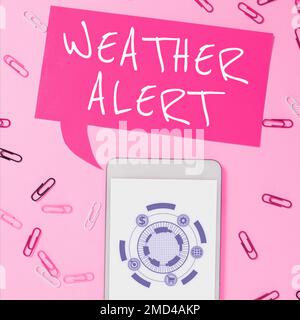 Hand writing sign Weather Alert. Word for urgent warning on the state of the atmosphere at a place and time Stock Photo