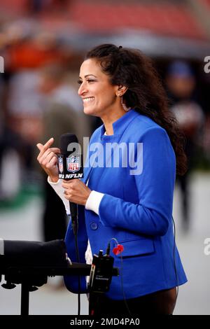 NFL Network reporter Aditi Kinkhabwala stands on the field prior to the  start of an NFL football game between the Cleveland Browns and the  Pittsburgh Steelers, Sunday, Oct. 31, 2021, in Cleveland. (