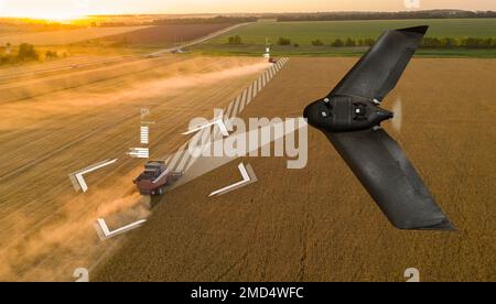 Autonomous combine harvester and drone Stock Photo - Alamy