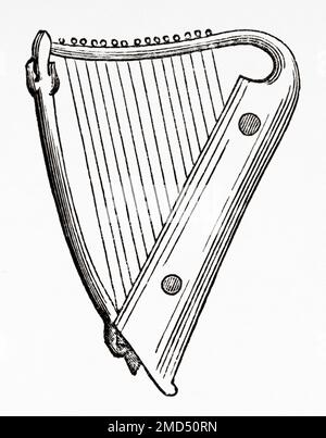 Fifteen string harp, 12th century. The Arts of the Middle Ages and at the Period of the Renaissance by Paul Lacroix, 1874 Stock Photo