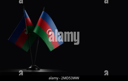 Small national flags of the Azerbaijan on a black background. Stock Photo