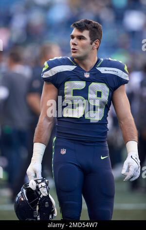 Seattle Seahawks linebacker Jon Rhattigan walks off the field with his  helmet off after playing the Jacksonville Jaguars in an NFL football game,  Sunday, Oct. 31, 2021, in Seattle. (AP Photo/ John