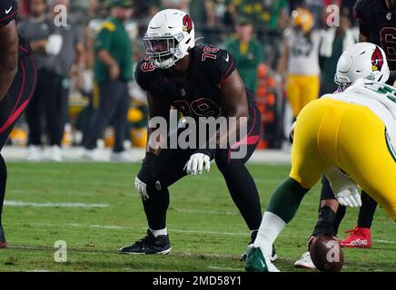 Arizona Cardinals offensive tackle Josh Jones, left, blocks Cardinals  linebacker Myjai Sanders (41) during NFL football training camp practice at  State Farm Stadium Monday, Aug. 7, 2023, in Glendale, Ariz. (AP Photo/Ross