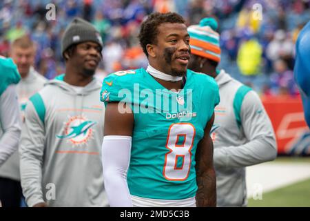 Miami Dolphins safety Jevon Holland (8) enters the field through the smoke  before an NFL football game against the Buffalo Bills, Sunday, Sept. 25,  2022 in Miami Gardens, Fla. The Dolphins defeat