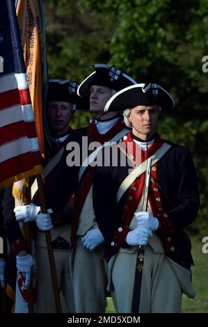 Soldiers with the 3rd U.S. Infantry Regiment (The Old Guard) wait for their cue off field during the Military District of Washington's 'Twilight Tattoo' at Joint Base Myer-Henderson Hall, Wednesday, July 13, 2022. The 'Twilight Tattoo' tells the history and story of the U.S. Army through the eyes of those who have served and their families. The show was hosted by Maj. Gen. John Andonie, deputy director of the Army National Guard. Stock Photo