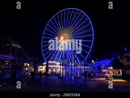 Vienna, Austria, Dec. 2019: Night view of ferris wheel Blumenrad in park Wurstelprater near Wiener Prater Stock Photo