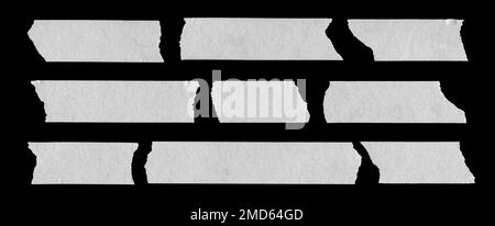 White paper torn piece isolated on black background. White paper ripped pieces isolated on black background.  clipping path  for isolation Stock Photo