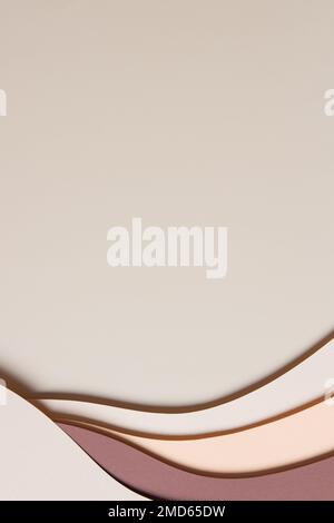 Abstract beige colored paper texture background. Minimal paper cut style composition with layers of geometric shapes and lines in shades of brown Stock Photo