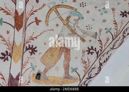 Medieval crossbow at an ancient gothic fresco in Elmelunde church, Denmark, October 10, 2022 Stock Photo