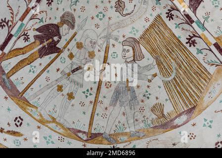 the self-growing corn and a man with a scythe hook, ancient legend at a wall-painting in Elmelunde, Denmark, October 10, 2022 Stock Photo