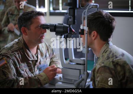 Officer Candidate School Physician Assistant students, with Blanchfield Army Community Hospital, taught a class in Ophthalmology and caring for eye trauma, infection, or injury, July 13, 2022, at Fort Campbell, Kentucky. The students received classroom instruction and then were able to practice techniques using a variety of equipment and methods of treatment. AMMED,BACH,DHA,Health,MHF,Medical, Stock Photo