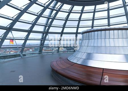 Inside the Bundestag dome. Tourists visit the parliament building of German government. Reichstag new dome interior. Stock Photo