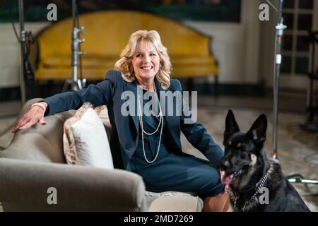 Reportage: First Lady Dr. Jill Biden and the Biden family dog Major prepare to tape a video segment with President Joe Biden for Super Bowl LV Wednesday, Feb. 3, 2021, in the Diplomatic Reception Room of the White House. Stock Photo