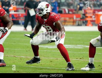 Arizona Cardinals offensive tackle Josh Jones, left, blocks Cardinals  linebacker Myjai Sanders (41) during NFL football training camp practice at  State Farm Stadium Monday, Aug. 7, 2023, in Glendale, Ariz. (AP Photo/Ross