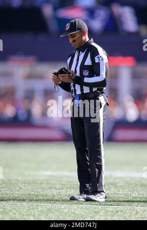 Side judge Dominique Pender (114) signals the other officials during the  first half of an NFL football game between the New York Jets and New  England Patriots, Sunday, Oct. 24, 2021, in