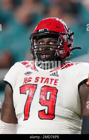 North Carolina State offensive tackle Ikem Ekwonu stands with NFL  Commissioner Roger Goodell after being picked by the Carolina Panthers with  the sixth pick of the NFL football draft Thursday, April 28