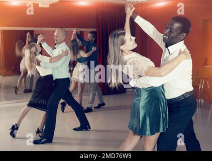 People learning to dance waltz Stock Photo