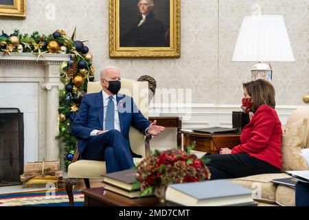Reportage: President Joe Biden meets with House Speaker Nancy Pelosi, D-Calif., Wednesday, December 1, 2021, in the Oval Office Stock Photo