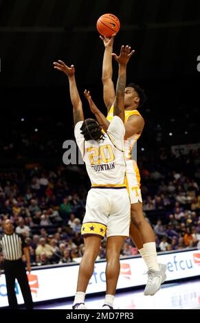 Tennessee guard Zakai Zeigler (5) shoots against LSU guard Jordan Sears ...