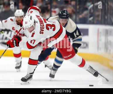 Carolina Hurricanes' Andrei Svechnikov (37) waits for a face-off against  the Columbus Blue Jackets during the third period of an NHL hockey game in  Raleigh, N.C., Monday, Feb. 15, 2021. (AP Photo/Karl