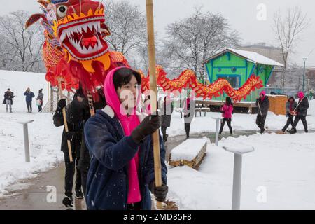 Detroit, Michigan, USA. 22nd Jan, 2023. The Michigan Taiwanese American Organization celebrates Lunar New Year with a parade, lion dance, and dragon dance at Valade Park. Credit: Jim West/Alamy Live News Stock Photo