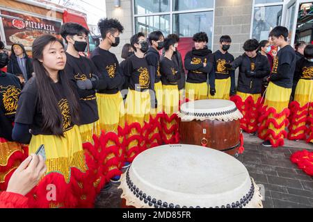 Detroit, Michigan, USA. 22nd Jan, 2023. The Michigan Taiwanese American Organization celebrates Lunar New Year with a parade, lion dance, and dragon dance at Valade Park. Members of the Michigan Lion Dance team await their time to perform. Credit: Jim West/Alamy Live News Stock Photo