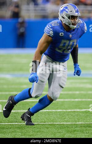 Detroit Lions outside linebacker Trey Flowers (90) runs onto the