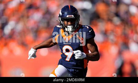 Denver Broncos wide receiver Kendall Hinton (9) runs with the ball during  the first half of an NFL football game against the Las Vegas Raiders,  Sunday, Oct. 2, 2022 in Las Vegas. (