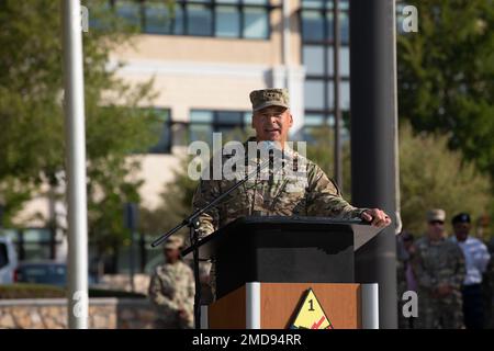 Outgoing Commanding General Maj. Gen. Sean C. Bernabe, 1st Armored Division, delivers his final remarks during a change of command ceremony at Fort Bliss, Texas, July 14, 2022.  During his speech, he thanked numerous people and reflected on the accomplishments of the 1st Armored Division and welcomed the incoming Commanding General Brig. Gen. James P. Isenhower III. Bernabe served as the commanding general and senior mission commander for Fort Bliss since September 2020. Stock Photo