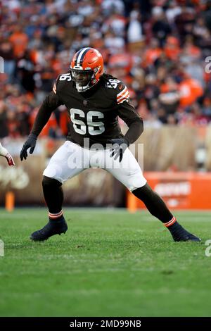 Cleveland Browns offensive tackle James Hudson III (66) walks back